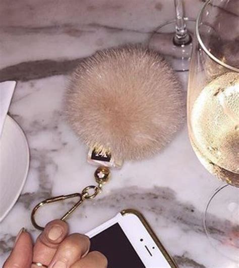 fur ball keychain louis vuitton|Louis Vuitton charms.